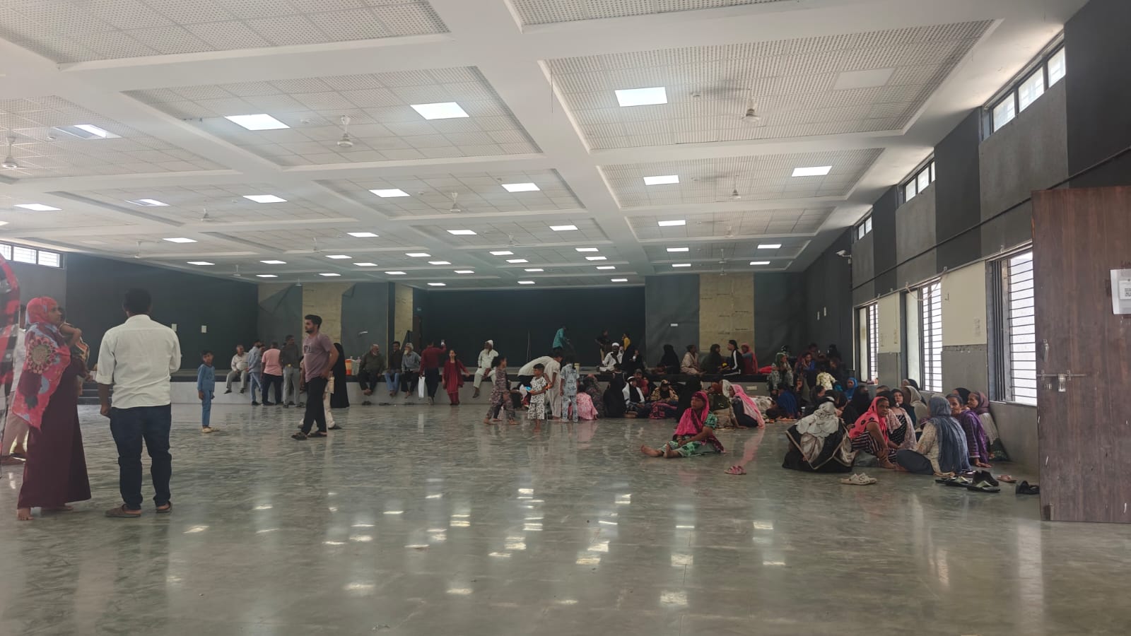 Weeks after shanties razed, Surat civic body shifts affected residents to temporary shelter | Ahmedabad News