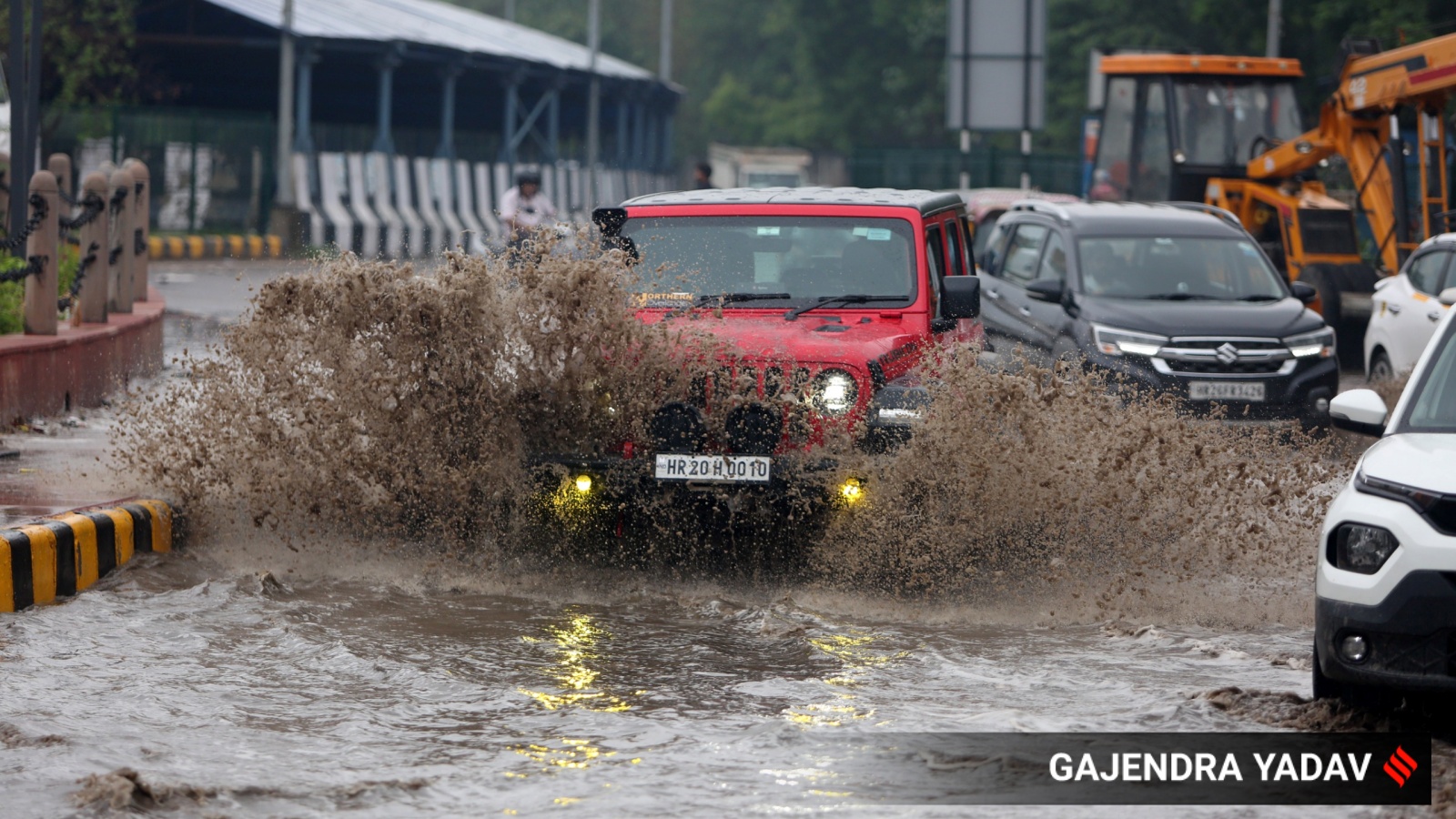 Traffic crawls as incessant rain floods key roads in Delhi; IMD sounds ‘red’ alert | Delhi News